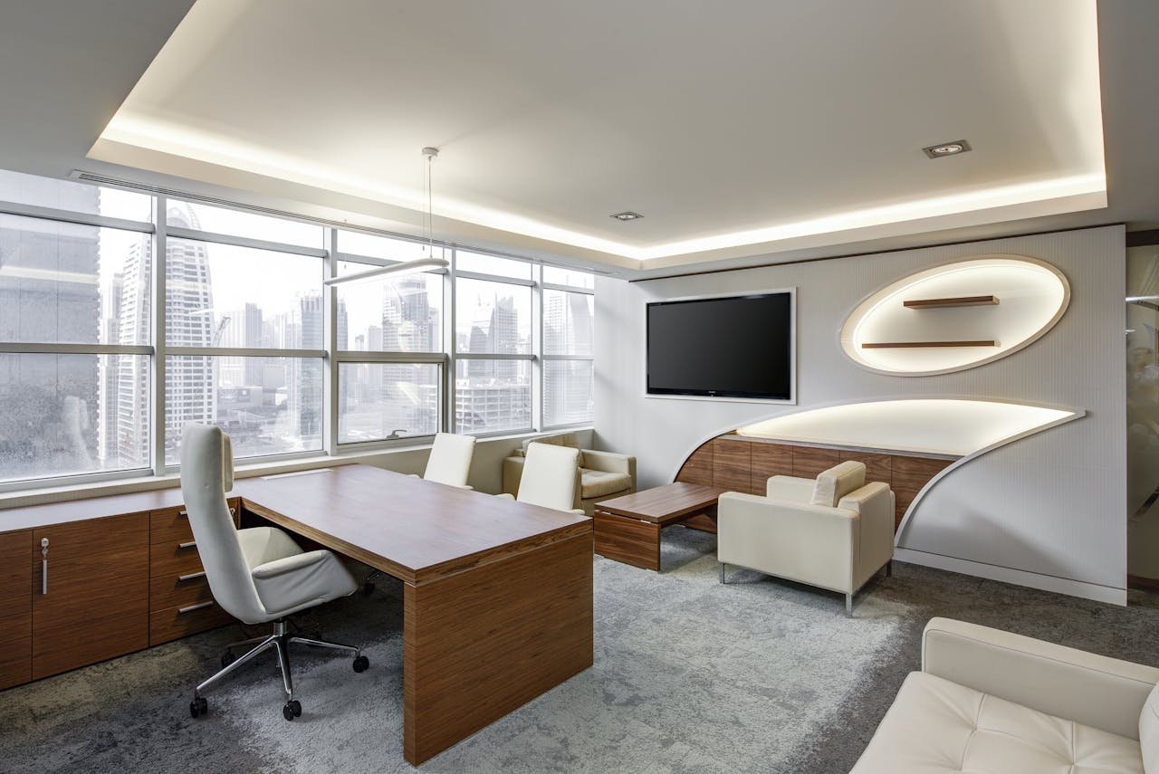 who-we-are Sleek office space featuring contemporary furniture and city skyline views, ideal for professionals.